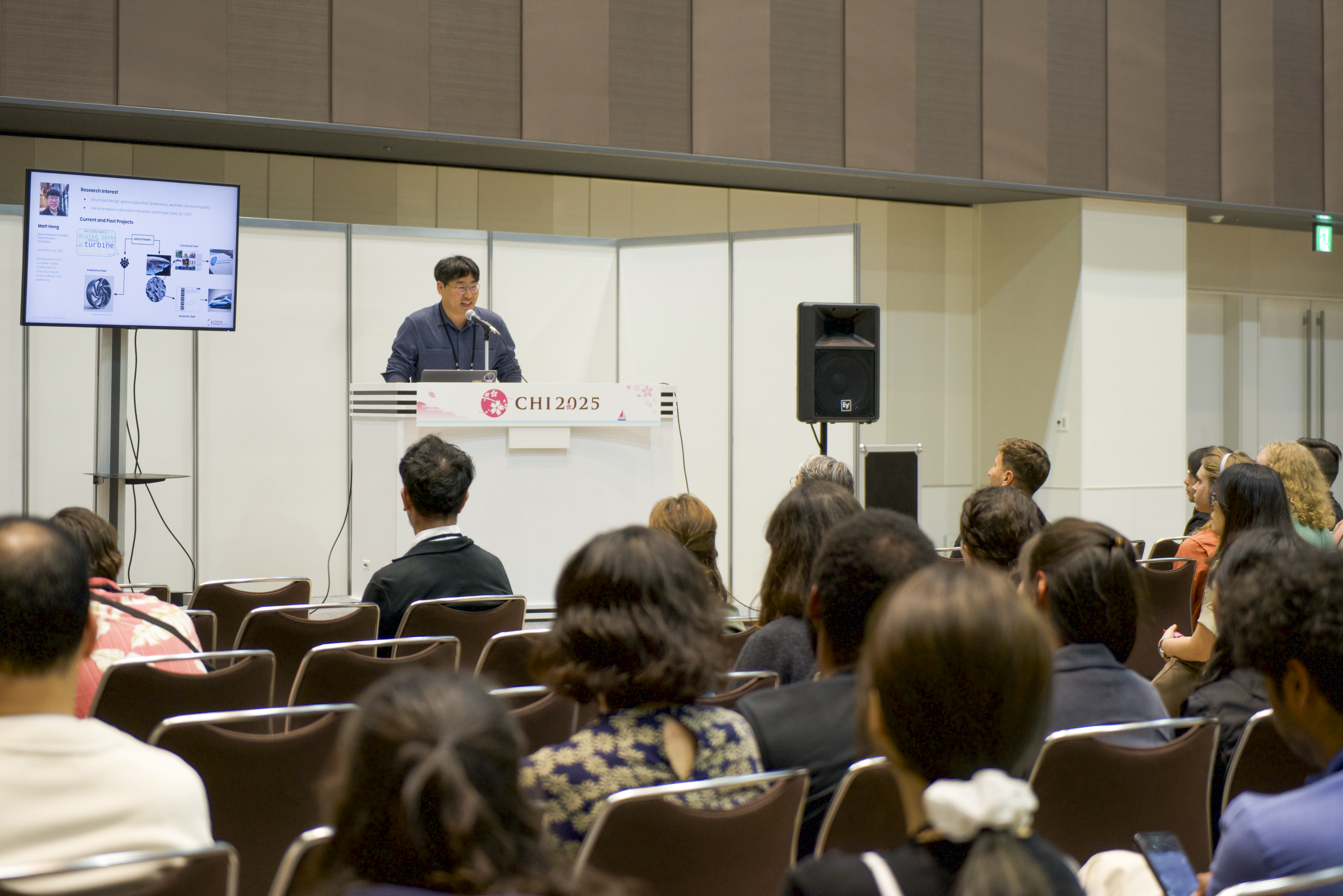 researcher presenting at conference